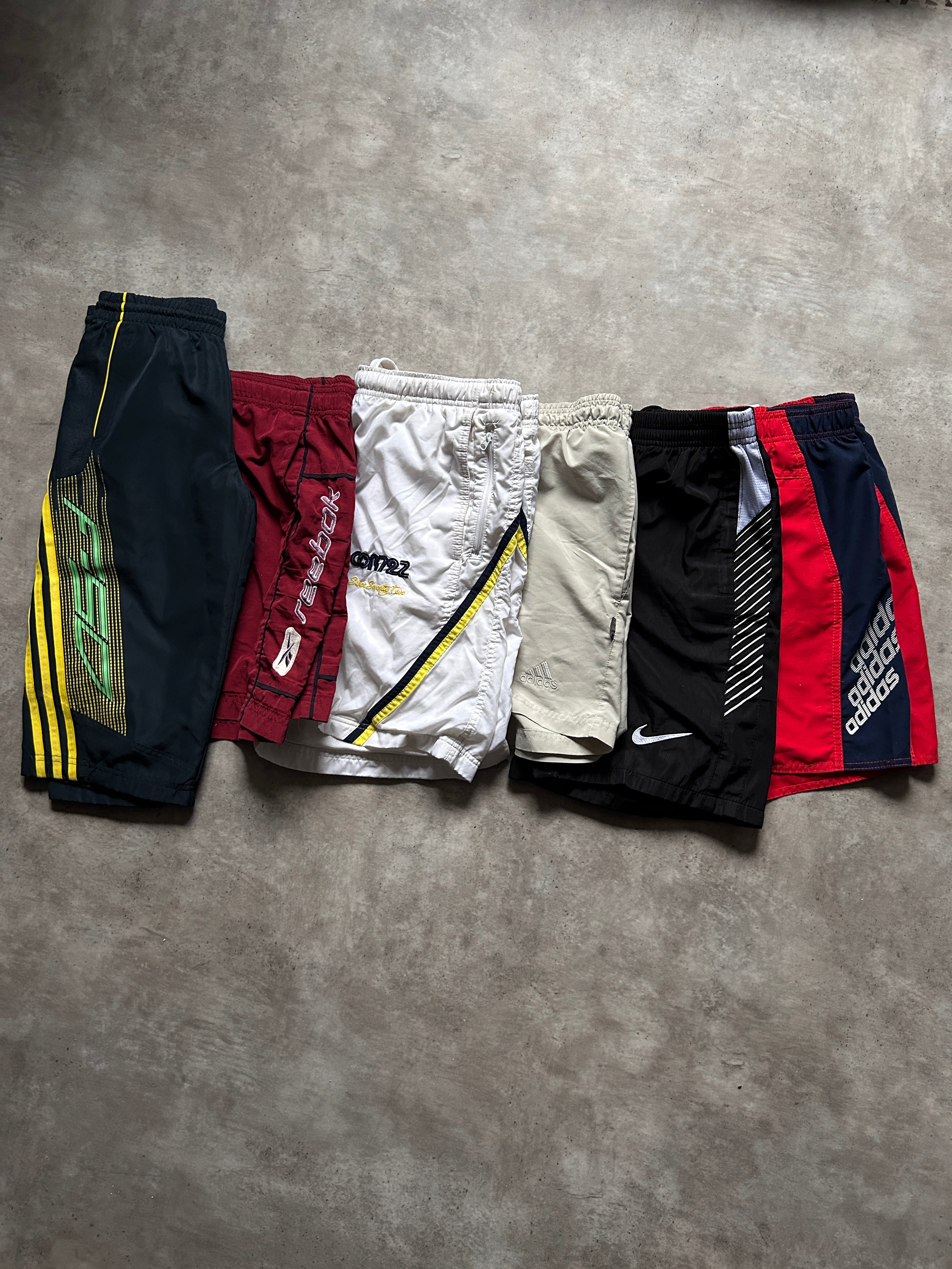 PANTALON CORTO  CHANDAL MARCA  PREMIUM